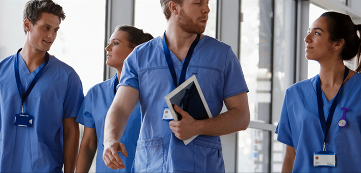 group of healthcare professionals walking through