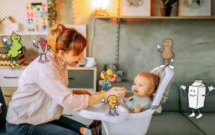 mother feeds child