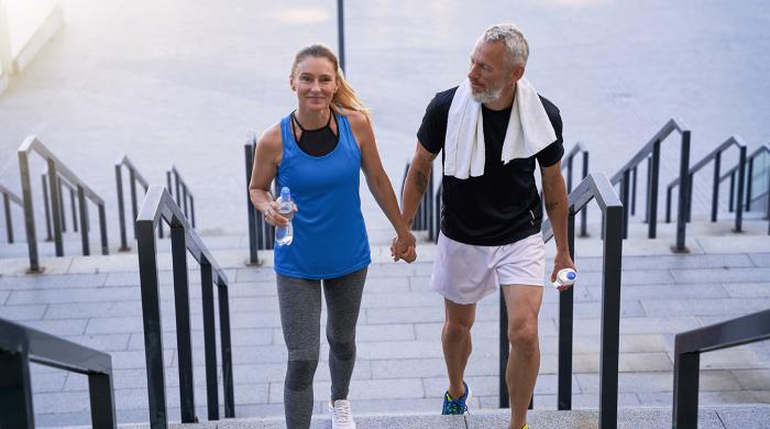 the happy couple walking